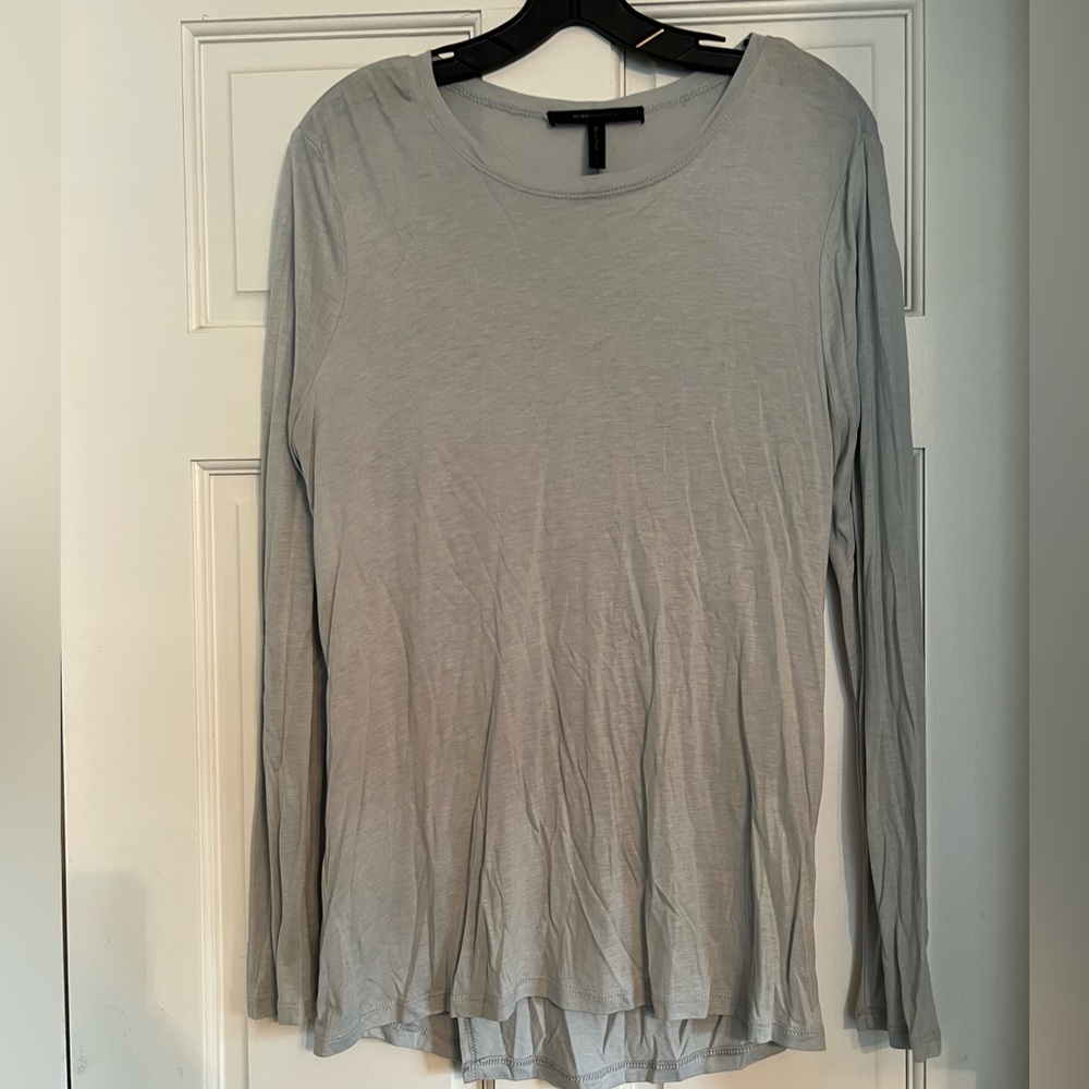 BCBG light blue long sleeve drape shirt.